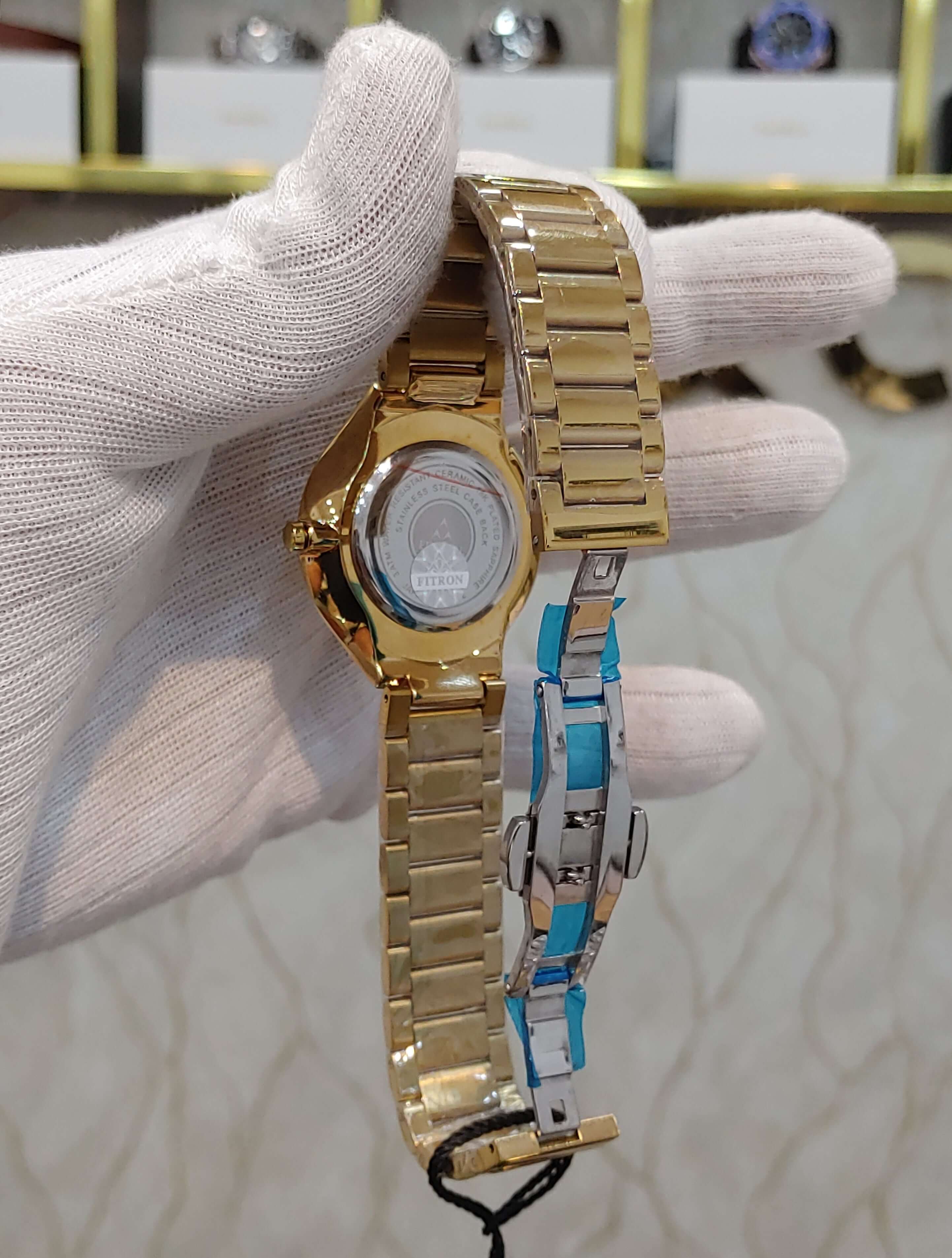 Fitron gold watch best sale